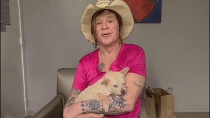 Actor Mickey Rourke and his dog