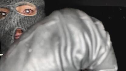 A reverse infrared enhancement of security camera footage of suspect in Nancy Guthrie's kidnapping