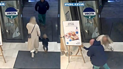 Mother and child exiting store while man enters