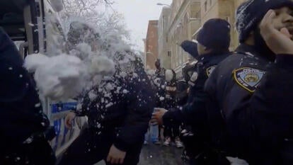 NYPD officers being hit with snowballs
