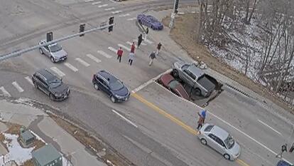 Giant Sinkhole Swallows Two Cars