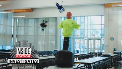 Two drones flying into a test dummy wearing a neon t-shirt