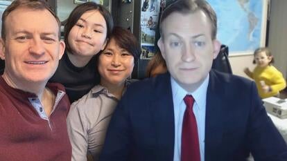 Robert Kelly, Marion Kelly, and Jung-a Kelly smiling in a family photo / Robert Kelly and 4-year-old Marion Kelly