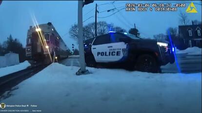 Cop Rescuing Woman Off Trains Tracks