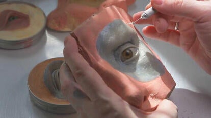 Painting a prosthetic face