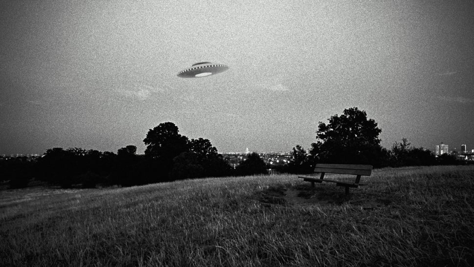 UFO in flight above park 