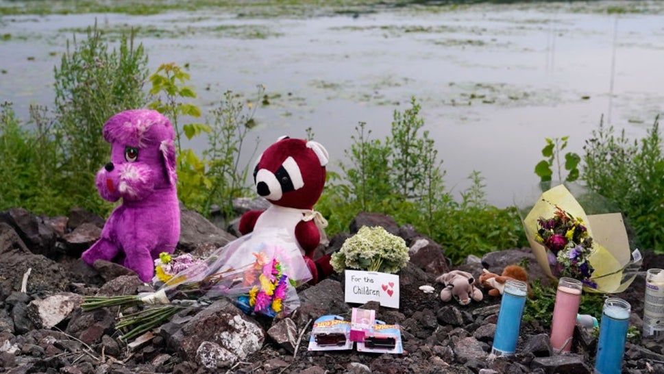 A memorial for three children who were drowned in Vadnais Lake sits on the edge of the lake on Sucker Lake Rd., near Vadnais Blvd. Monday, July 4, 2022 in Vadnais Heights, Minn. After her husband died by suicide Friday at their Maplewood home, Molly Cheng drove her three young children to Vadnais-Sucker Lake Regional Park. The bodies of all four were recovered from Vadnais Lake by Saturday morning; law enforcement suspects their deaths were a murder-suicide. All three children were under the age of 6.