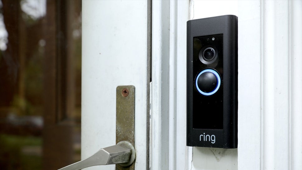 Amazon Ring Video Doorbell next to a door