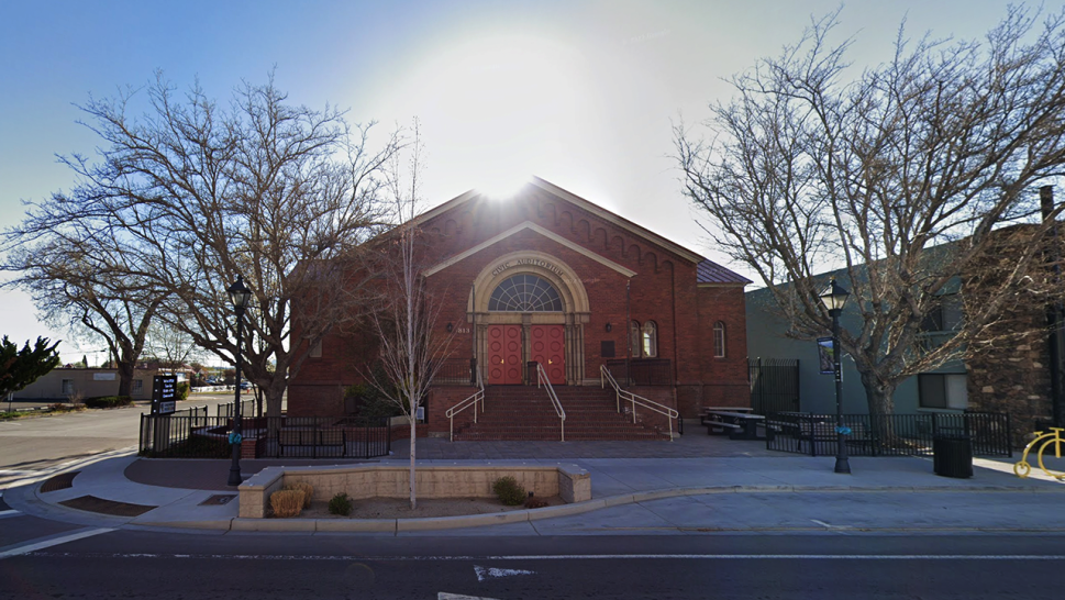 Image of the entrance to the Children's Museum of Northern Nevada. It is a brick building with red doors and lettering reading 'civic auditorium.'
