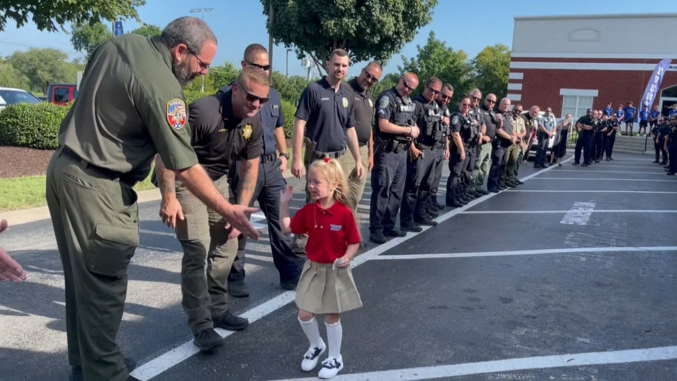 Daughter of Fallen Cop Receives Police Escort to School