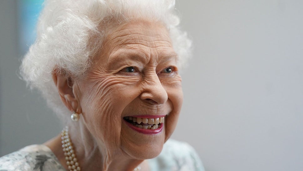 Britain's Queen Elizabeth II smiles during a visit to officially open the new building of Thames Hospice in Maidenhead, Berkshire, on July 15, 2022.