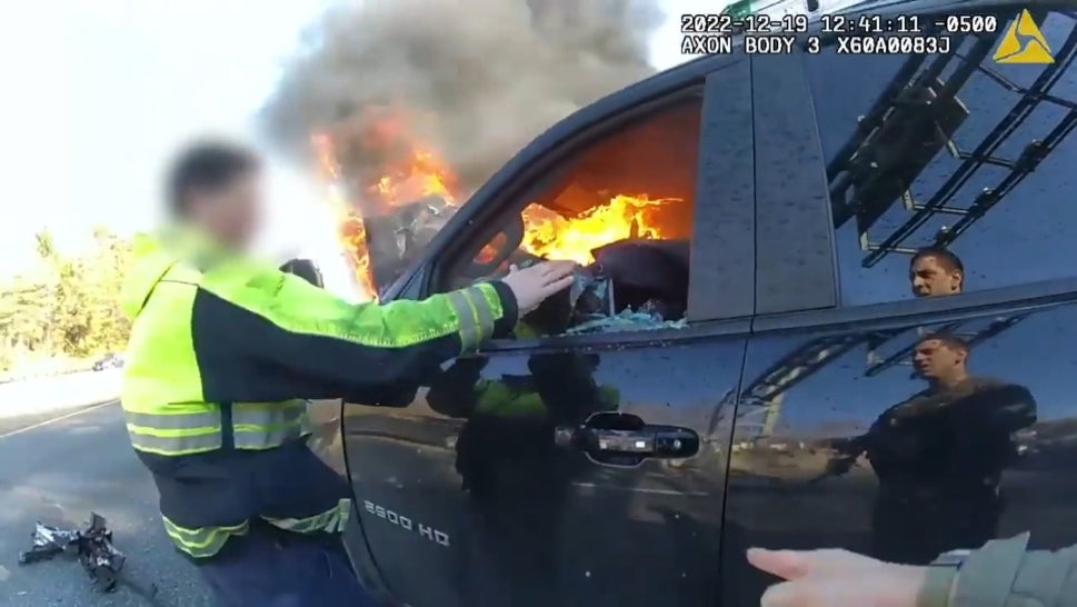 Rescuers Break Window to Save Unconscious Driver From Fire