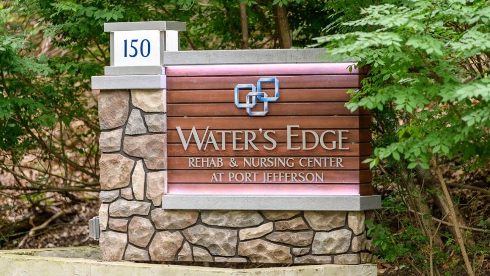 Sign reading "Water's Edge Rehab and Nursing Center at Port Jefferson" 