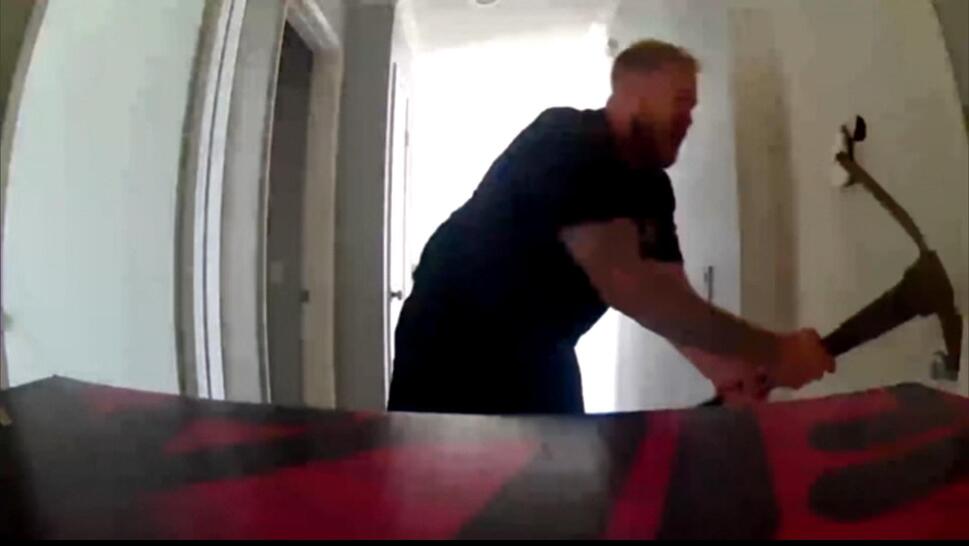 Pickaxe-Wielding Man Smashes His Roommate’s Door