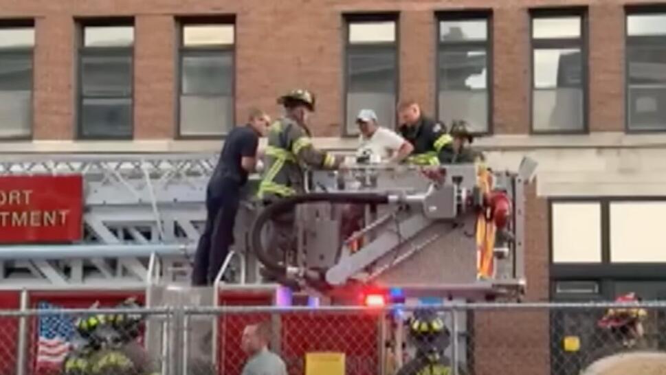 Firefighters rescuing Lisa Brooks