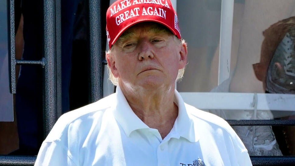 Former US President Donald Trump looks on during Round 3 at the LIV Golf-Bedminster 2023 at the Trump National in Bedminster, New Jersey on Aug. 13. Trump was indicted Aug. 14 on charges of racketeering and a string of election crimes after a sprawling two-year probe into his efforts to overturn his 2020 defeat to Joe Biden in the US state of Georgia, according to a court filing.