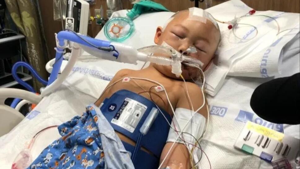 6-year-old Jeremy in hospital bed