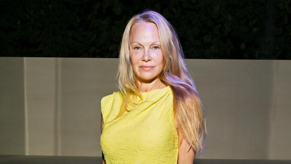 Pamela Anderson Embraces Makeup-Free Look at Paris Fashion Week