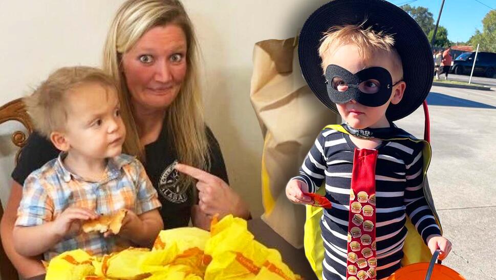 mom and son with cheeseburgers / toddler dressed as hamburglar for Halloween