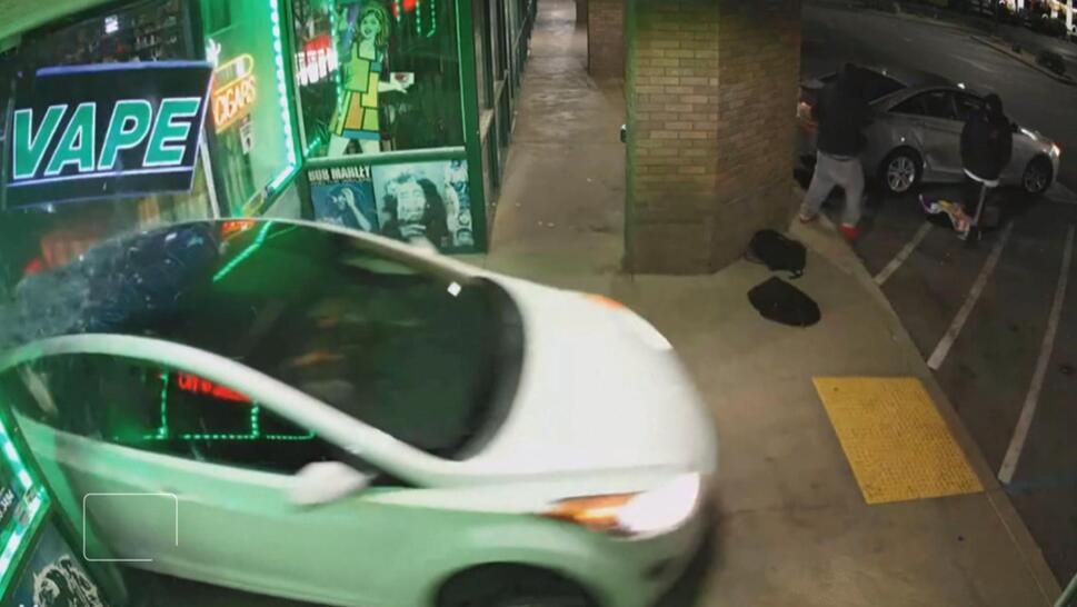 Car rams into store.
