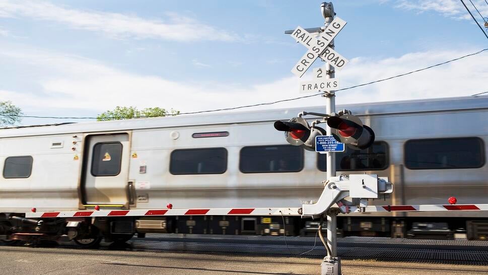 Train Slams Into Car on Track