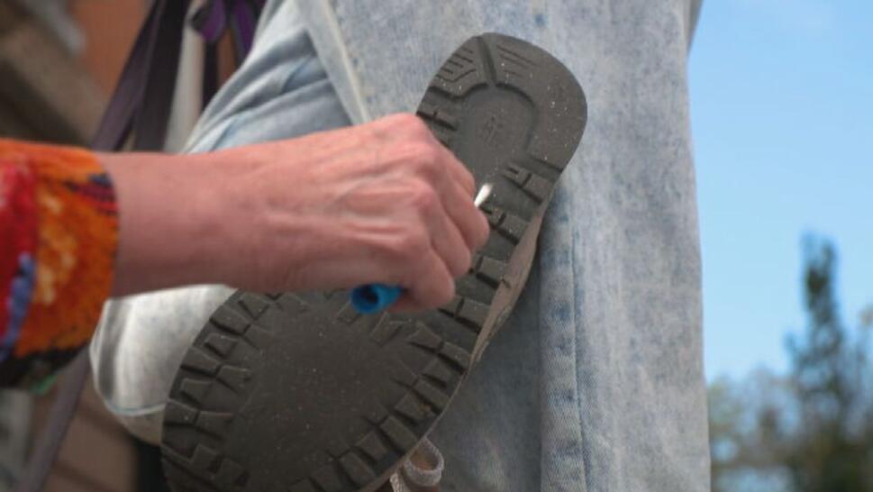 bottom of shoe being swabbed