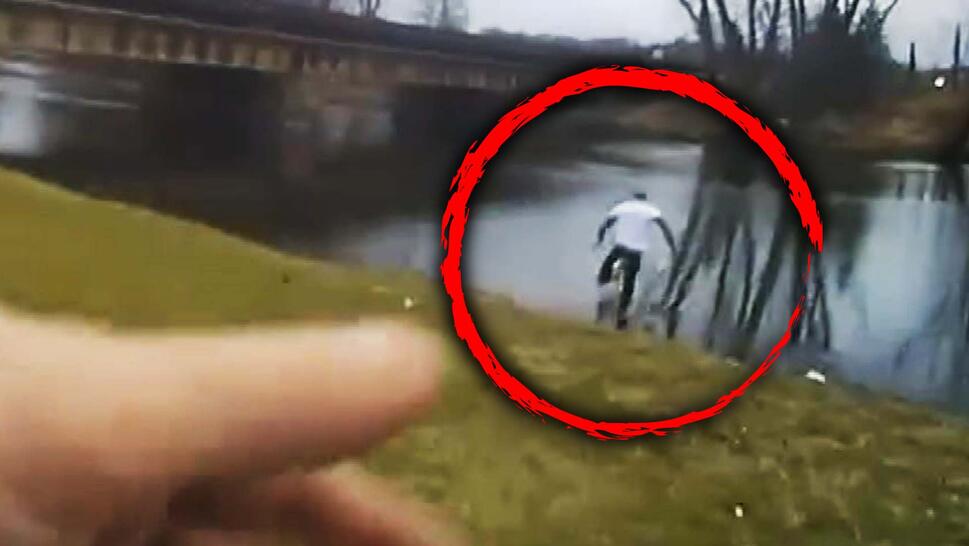 man jumps into river