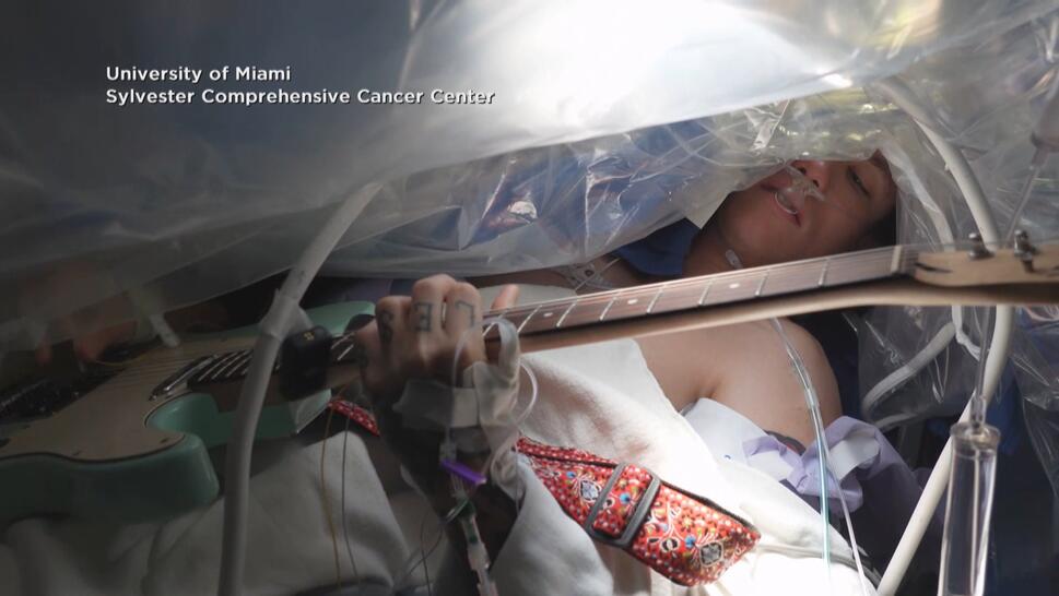 Christian Nolen was awake and playing guitar as his brain was being operated on at the University of Miami Sylvester Comprehensive Cancer Center.