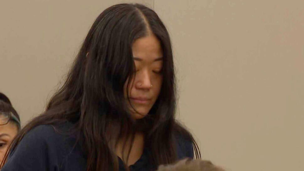 Jaqueline Ma bowing her head in court 