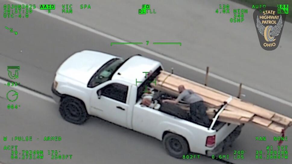 white pickup truck in highway chase