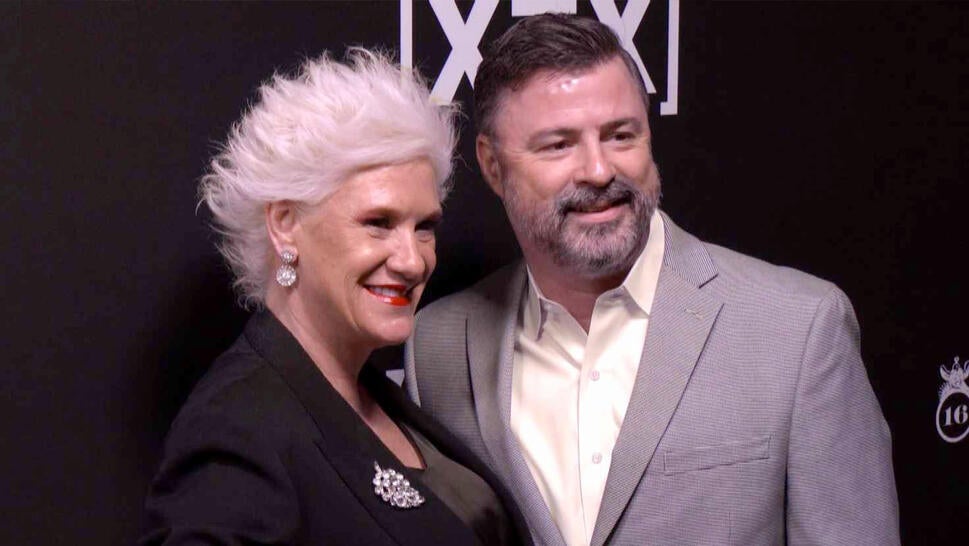 Anne Burrell and her husband on a red carpet