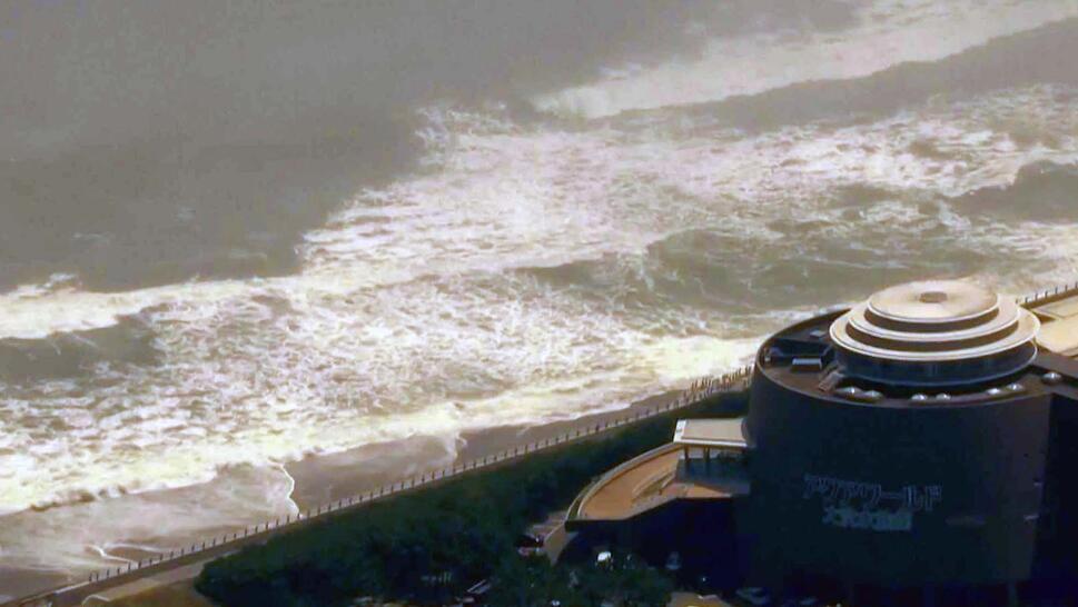 Coastline of Japan experiencing tsunami waves