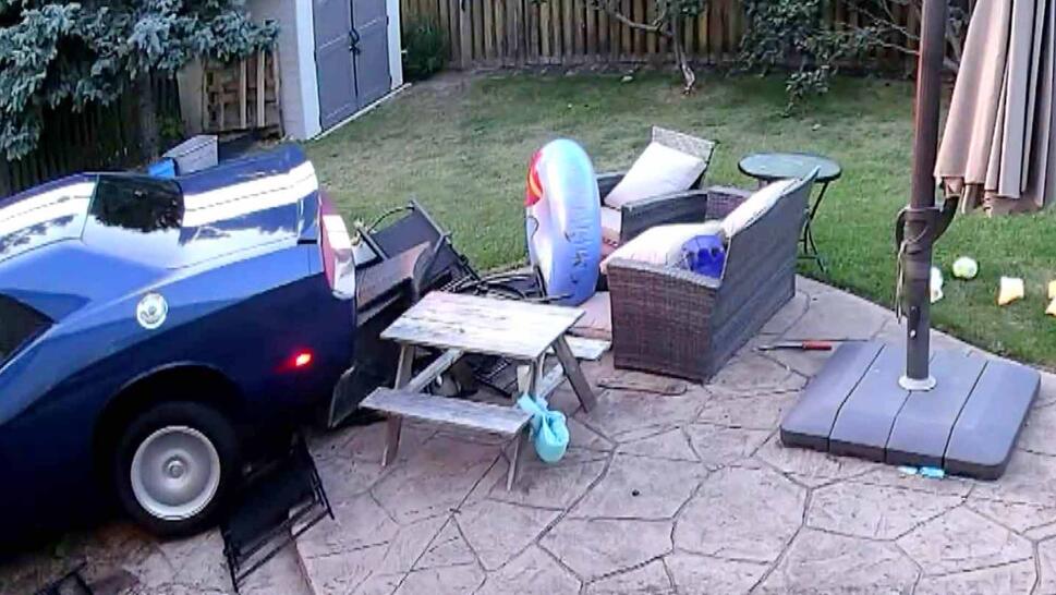 Security footage of a car crashed into a house 