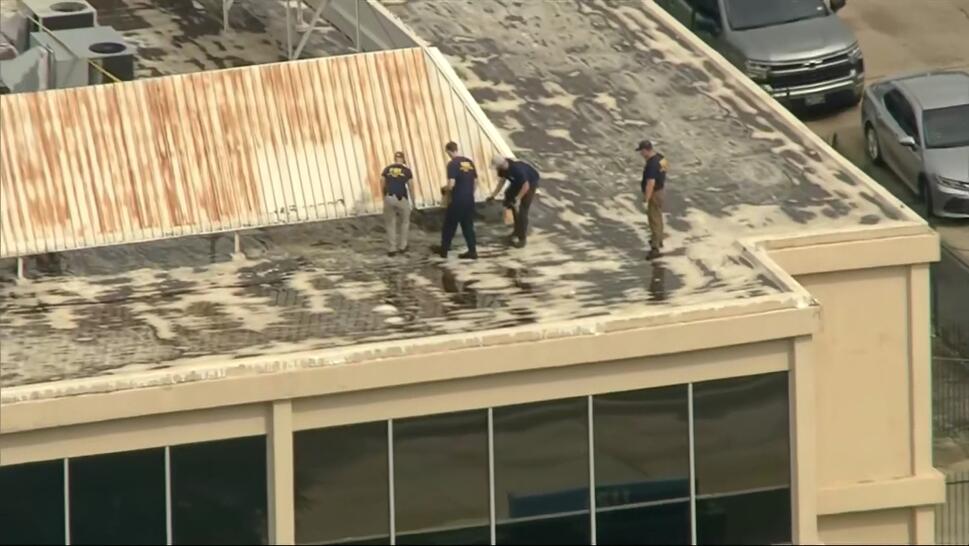 roof in Dallas where gunman opened fire on an ICE van 