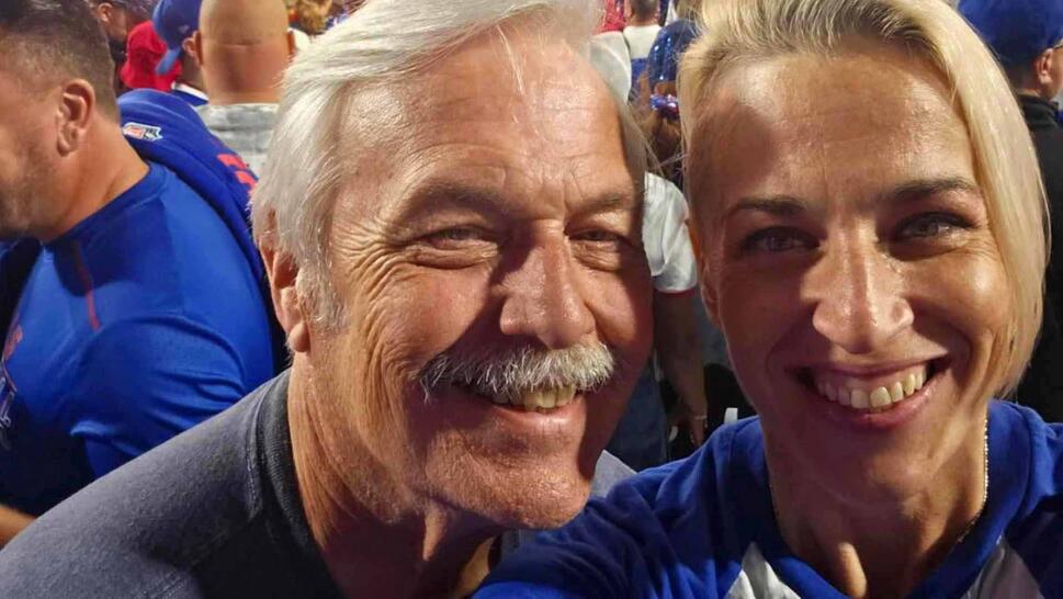 Father and daughter in the crowd at a Buffalo Bill's game