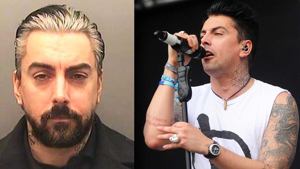 Ian Watkins mugshot, singing on stage