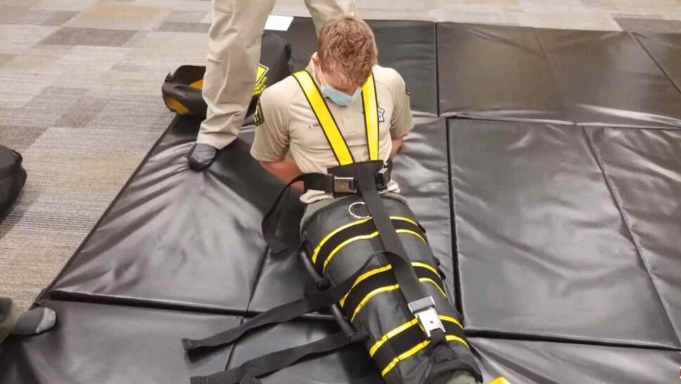 Law enforcement officer restrained during training