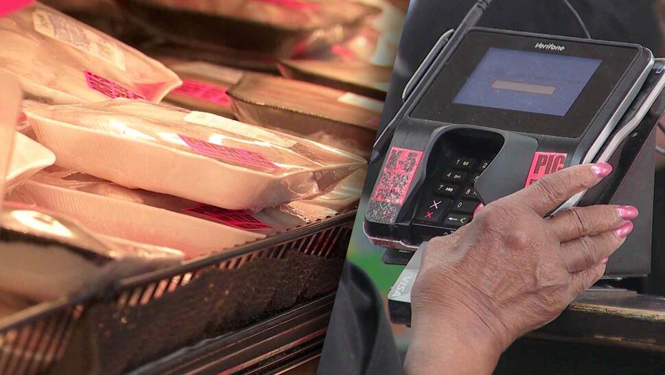 Packaged meat at grocery store, credit card reader