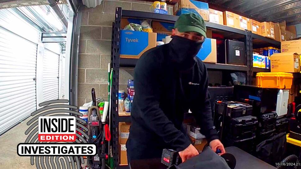 Man with a mask and a hat inside a storage unit 