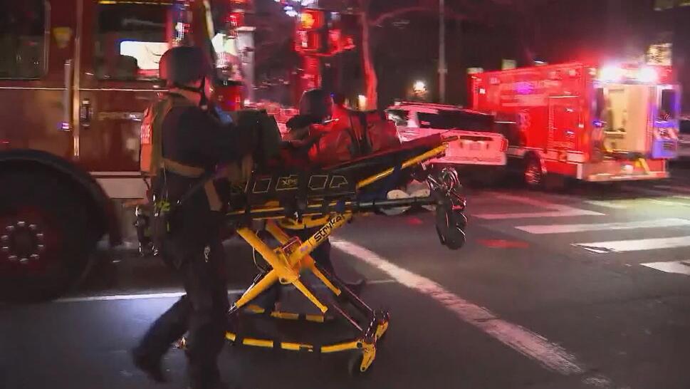 Police and EMTs on the scene at Brown University after shooting