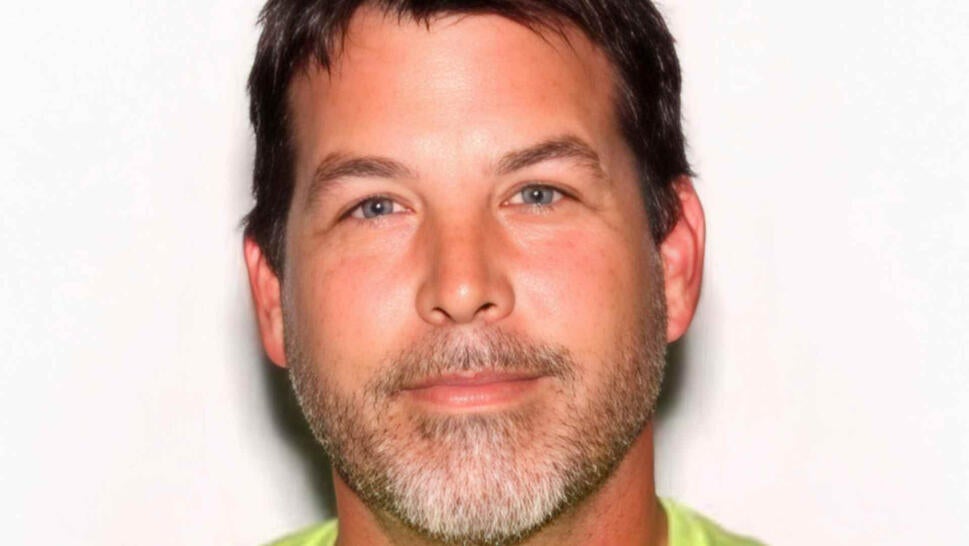 Jason Kenney smiling to camera