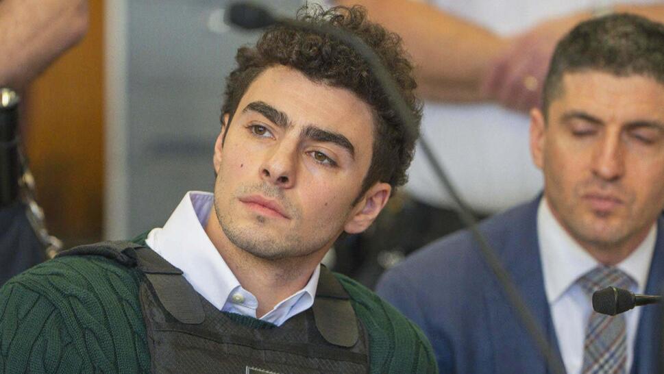 Luigi Mangione sitting in court