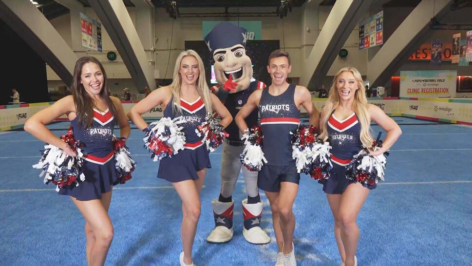 NFL Cheerleaders posing in their uniforms