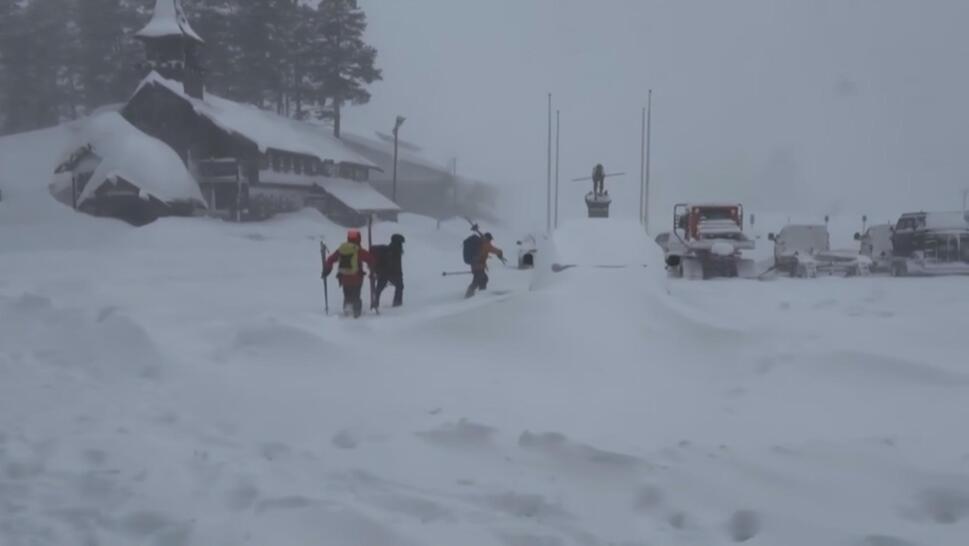 Still from video of skiers