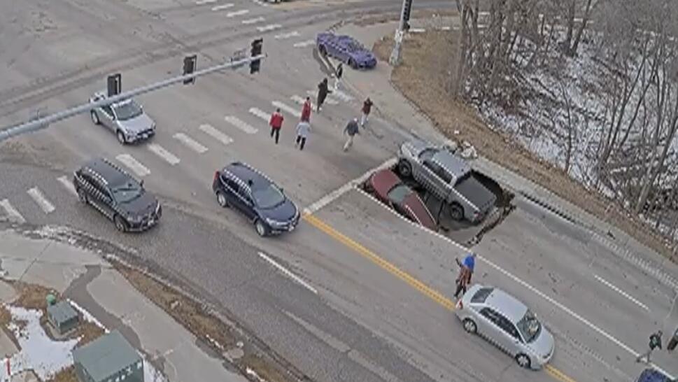 Giant Sinkhole Swallows Two Cars