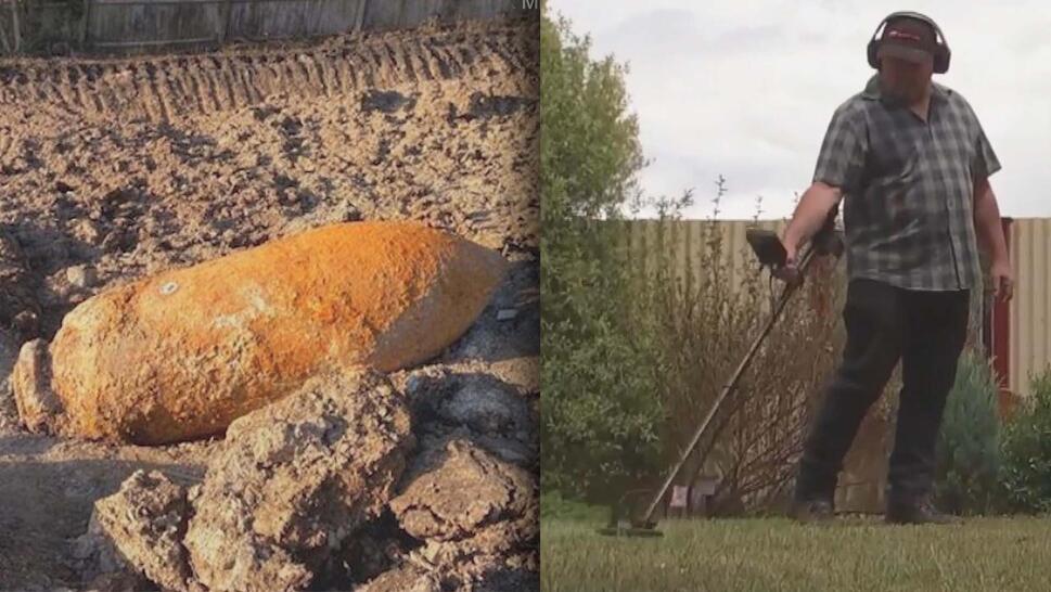 Large metal object exposed from under dirt / Man with a metal detector searching a field