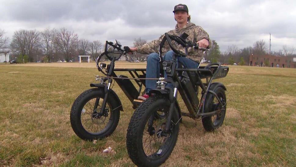 Man sitting in wheelchair for outdoor activities.