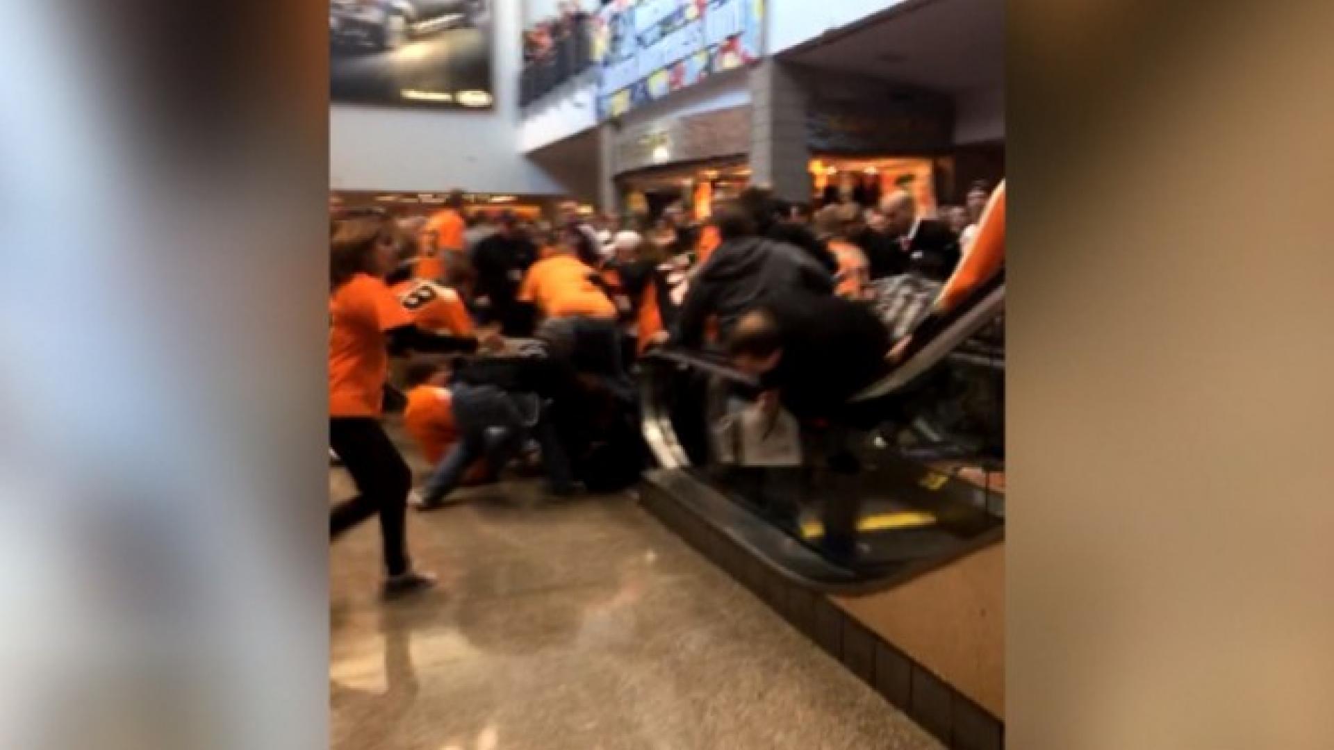 Malfunctioning Escalator Sends Hockey Fans Flying After Game | Inside  Edition