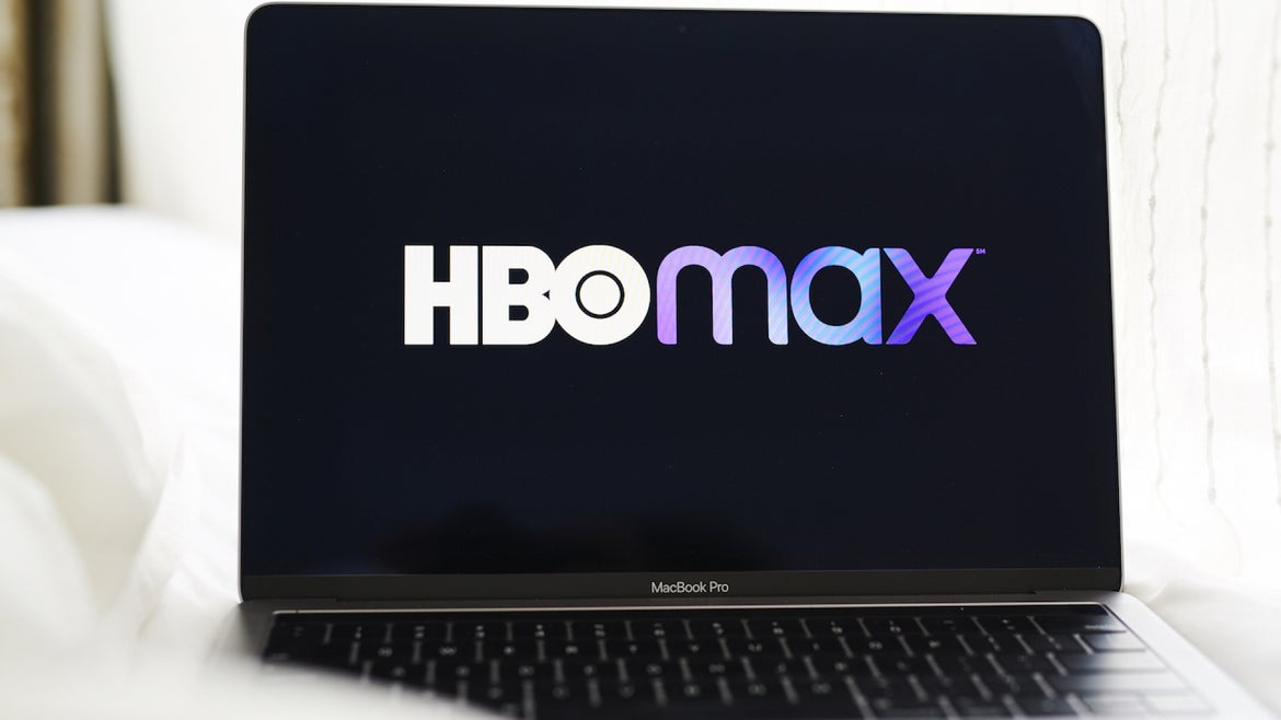 Signage for the AT&T Inc. WarnerMedia HBO Max streaming service is displayed on a laptop computer in an arranged photograph taken in the Brooklyn Borough of New York, U.S., on Thursday, May 28, 2020