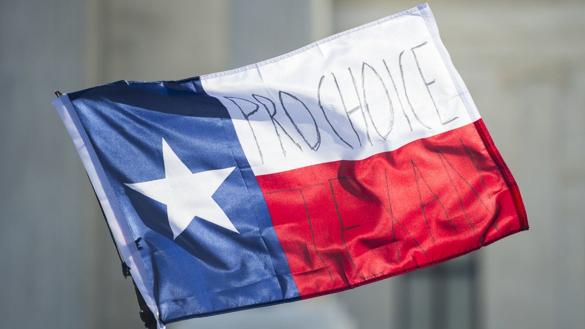 Pro-choice written on Texas flag